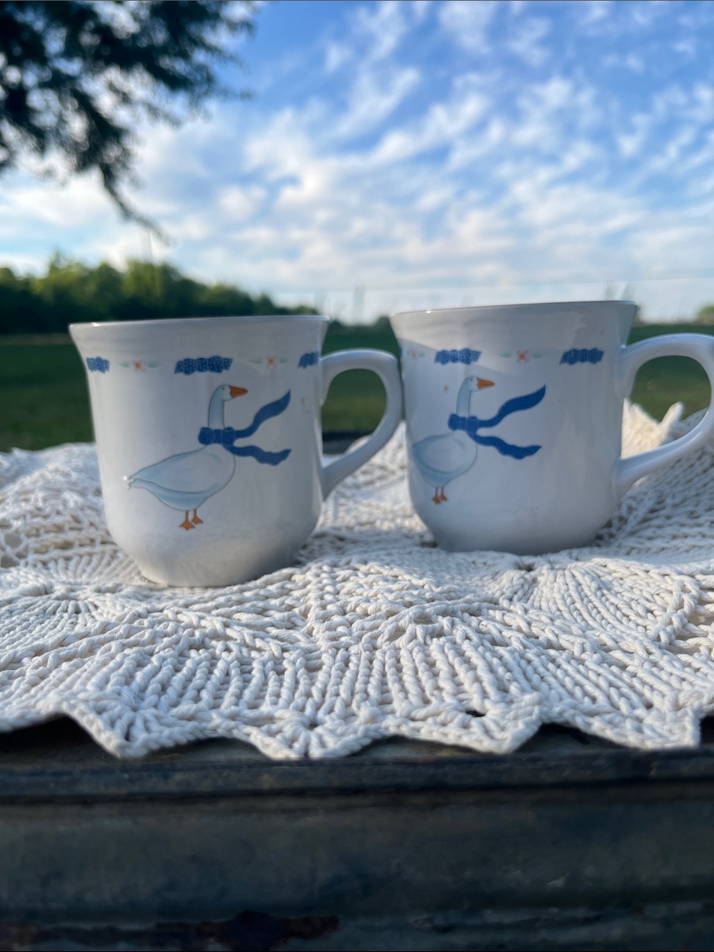 White Ceramic Goose Mugs with Blue Scarf Design